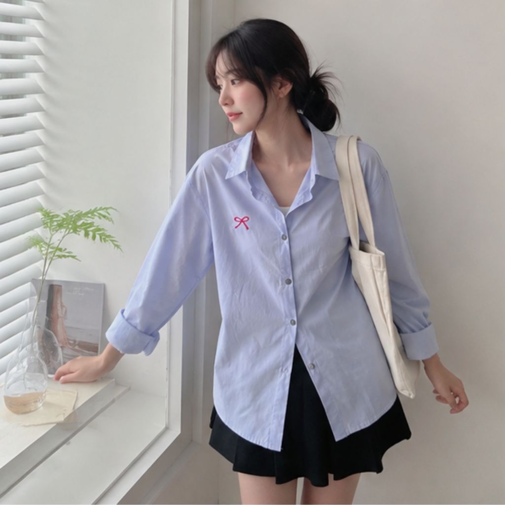 Áo sơ mi thô mềm form rộng thêu nơ – phong cách Hàn Quốc nữ tính
