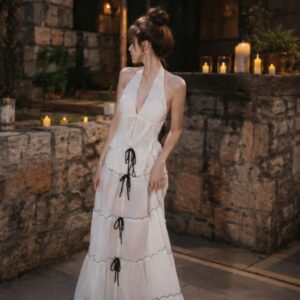 Set áo xẻ ngực hở lưng phối chân váy dài đính nơ sang chảnh đi biển - Hình ảnh 4