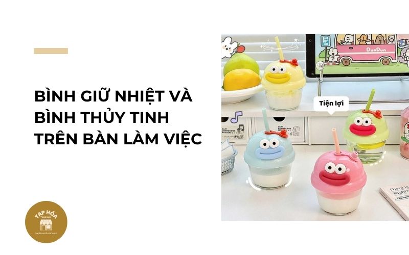 Bình giữ nhiệt và bình thủy tinh trên bàn làm việc