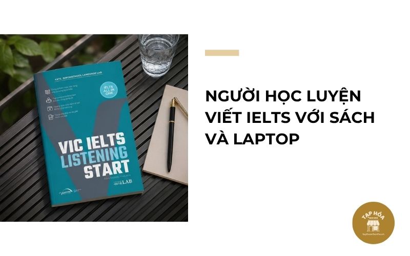 Người học luyện viết IELTS với sách và laptop